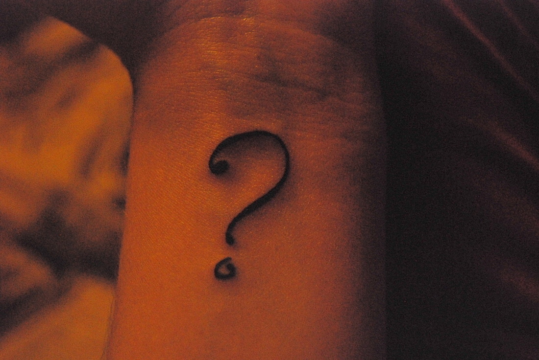Have you seen anyone with a huge question mark tattoo on their face? Here's  what it's about. - Dandy Goat
